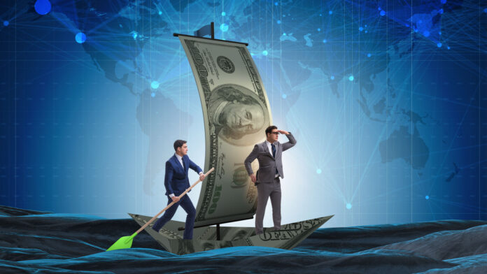 Business partnership with businessmen sailing on dollar boat