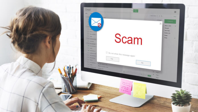 Spotting email scam An employee reading phishing email