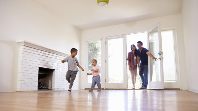 Excited,Family,Explore,New,Home,On,Moving,Day