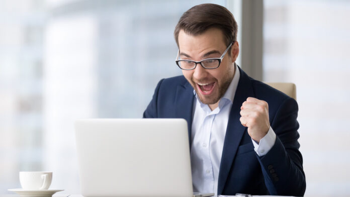 Excited,Businessman,In,Suit,Feeling,Winner,Celebrating,Online,Victory,Business