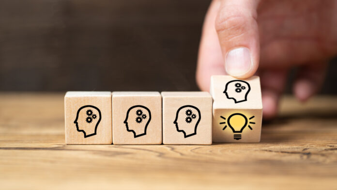 Cubes,With,Head,Symbols,And,Hand,That,Flips,One,Revealing