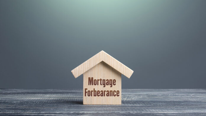 Wooden,House,Figurine,With,Inscription,Mortgage,Forbearance.,Borrower,And,Lender