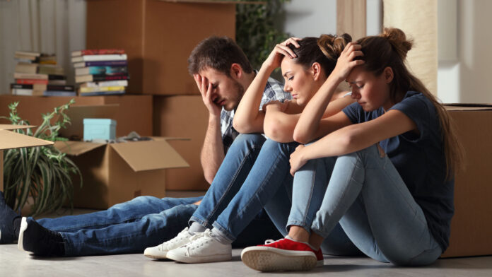 Three,Sad,Evicted,Roommates,Moving,Home,Complaining,Sitting,On,The