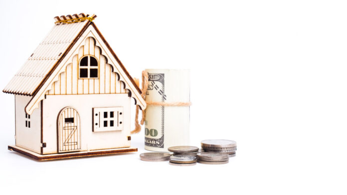 A,Picture,Of,Home,Miniature,With,Fake,Coin,And,Coin