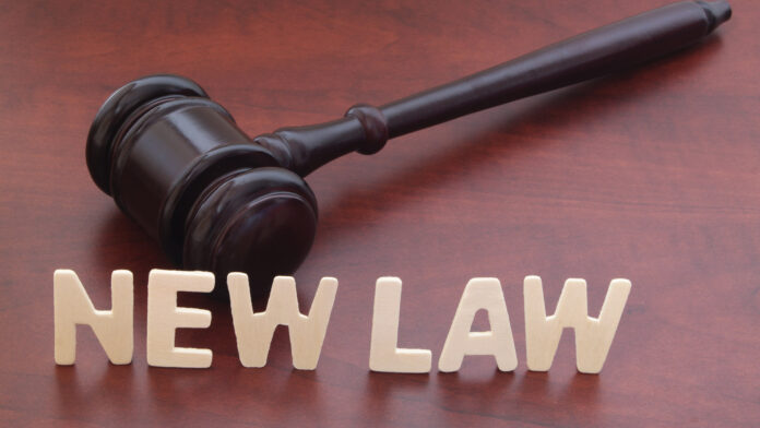 New,Laws,Concept.,Words,New,Law,And,Judge,Gavel,On