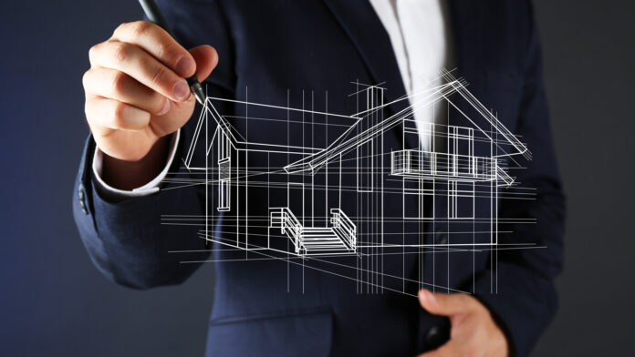 Real,Estate,Offer.,Businessman,Drawing,A,Model,Of,The,House