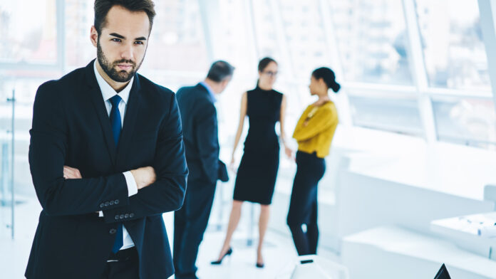 Confident,Man,If,Elegant,Suit,Looking,Away,While,Male,And