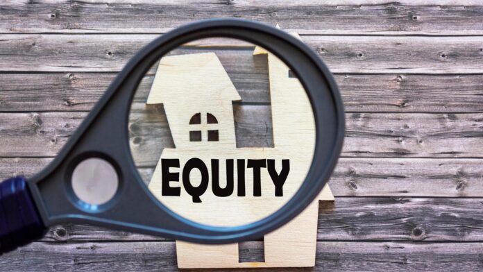 Text,Equity,Written,On,A,Magnifying,Glass,Against,The,Background