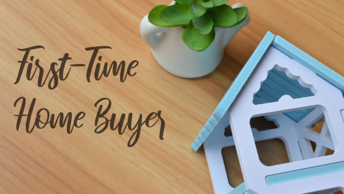 Top,View,Of,Toy,Wooden,House,And,Plant,Over,Wooden