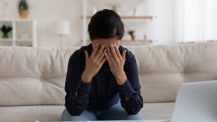 Sad,Stressed,Young,Indian,Female,Deal,With,Bankruptcy,Of,Her