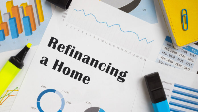Financial,Concept,Meaning,Refinancing,A,Home,With,Sign,On,The